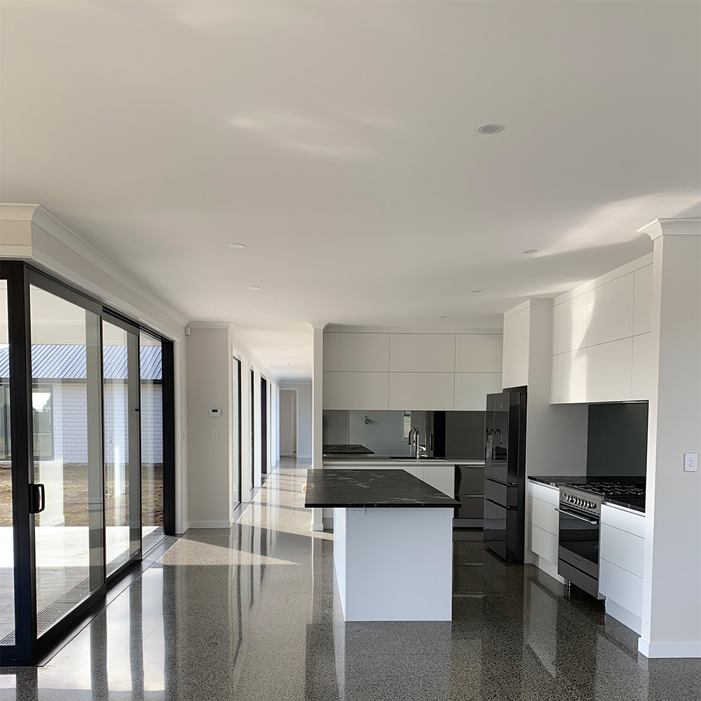 Newly painted new-build kitchen by MIM Limited